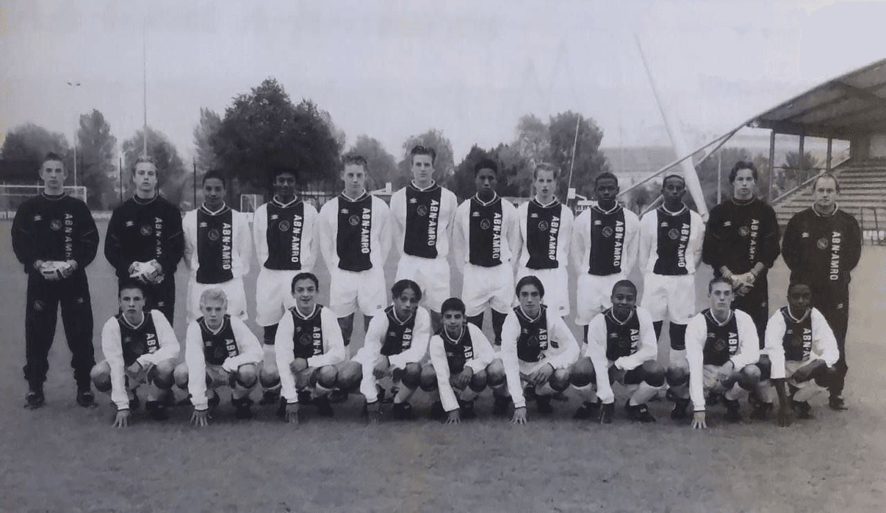 Ajax youth football team posing on the pitch